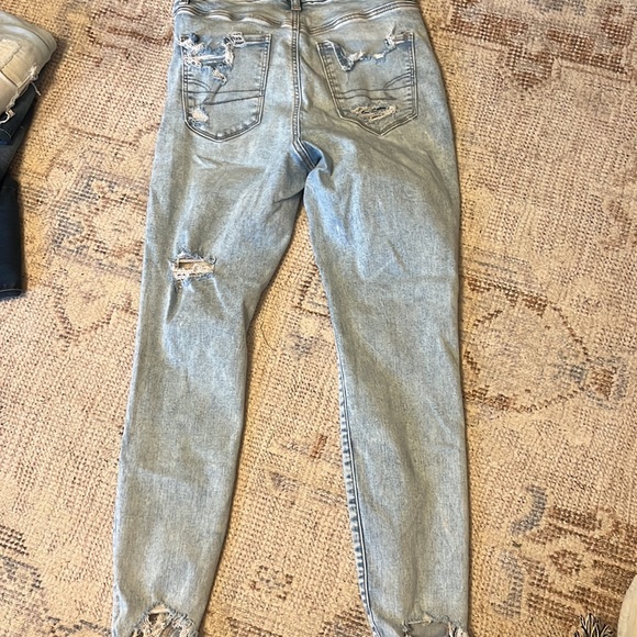 Light washed Ripped Jeans - Picture 2 of 2